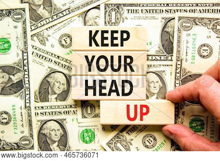 Keep Your Head Up Symbol. Concept Words Keep Your Head Up On Wooden Cubes. Beautiful Background From