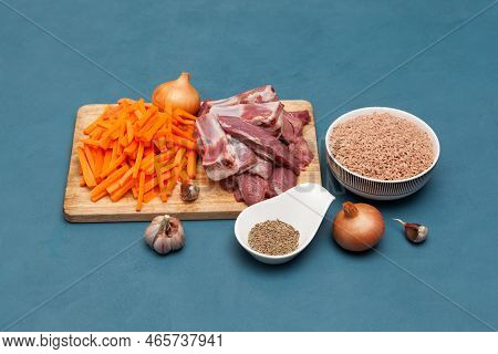 Oriental Cuisine. Ingredients For National Uzbek Pilaf With Meat Lamb And Lightly Sanded Devzira Ric