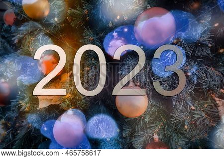 Blurry Bokey Christmas Lights During Holiday Season And 2023 Sign