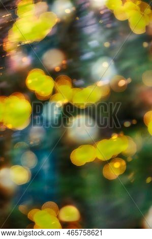 A Background Picture Of Festive Bokey Blurry Christmas Lights During The Holiday Season