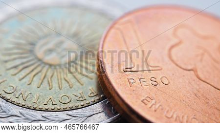 Coin Of 1 Argentine Peso Close Up. One Peso Coins Of Argentina. News About Economy Or Finance. Loan 