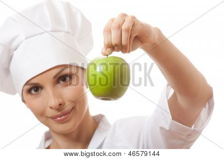 Smilende kvinde cook med apple, isoladed på hvid baggrund