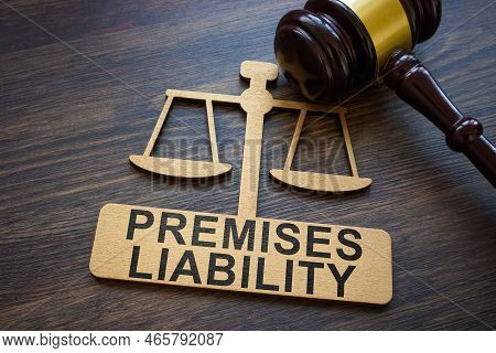 Plate With Inscription Premises Liability And Gavel.