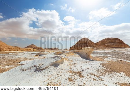 White Desert Bahariya Egypt. White Limestone Rock Formations And Sand Desert Landscape. One Off Road