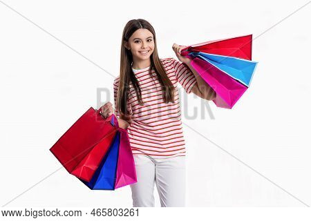 Cheerful Shopper Girl Holding Shopping Bag In Shop Studio. Shopper Girl Go To Shop.