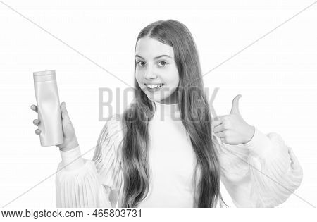 Happy Child Presenting Product Of Shampoo Hair Conditioner Or Shower Gel Show Thumb Up, Lotion.