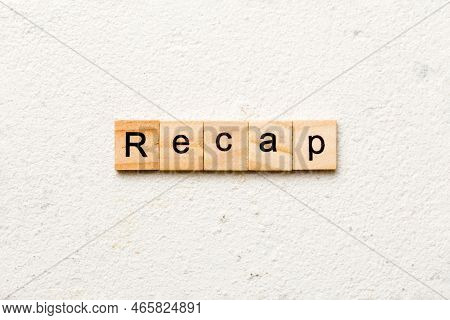 Recap Word Written On Wood Block. Recap Text On Table, Concept.
