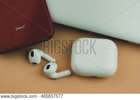 Bangkok, Thailand - November 21, 2022 : New Apple Airpods 3 With Magsafe Charger And I Phone 11 Red.
