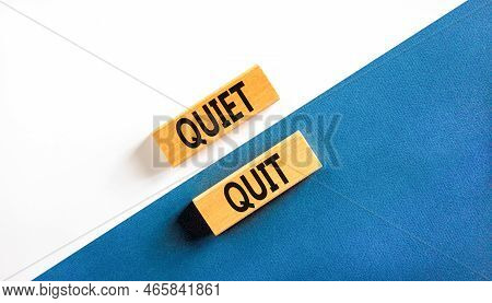 Quiet Quit Symbol. Concept Words Quiet Quit On Wooden Blocks. Beautiful White And Blue Background. B