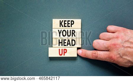 Keep Your Head Up Symbol. Concept Words Keep Your Head Up On Wooden Cubes. Beautiful Grey Table Grey