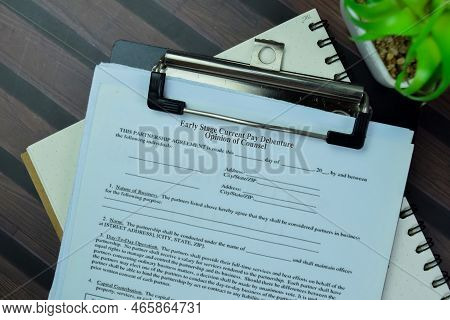 Concept Of Sba Form Early Stage Current Pay Debenture Opinion Of Counsel Isolated On Wooden Table.