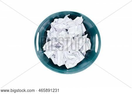 Plastic Trash Can Being Filled With Crumpled Sheets Of White Paper, Isolated On A White Background