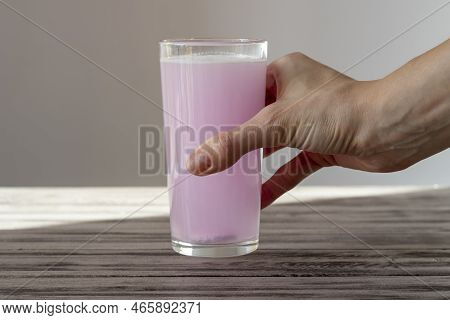 Electrolyte Tablet Is Dissolved In Water. Female Hand Holds A Glass Of Rosewater. Oral Rehydration S
