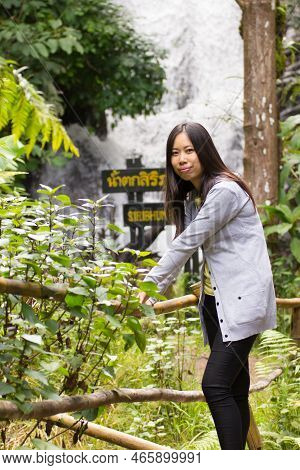 Portrait Thai Woman At Siribhum Waterfall Doi Inthanon National Park, Chiangmai Thailand