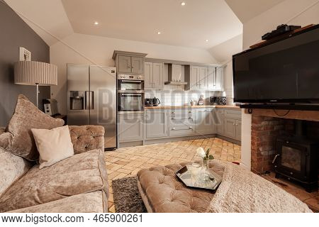 Toft, Cambridgeshire, England - March 4 2019: Open Plan Furnished Luxury Kitchen Living Room With Bu