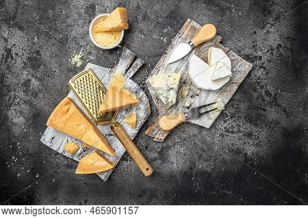 Parmesan. Different Types Of Cheese With Knife On A Dark Background. Cheeses Set Dor Blu Chedar Cama