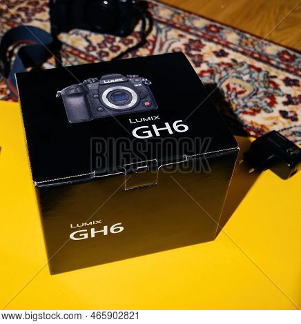 London, United Kingdom - Jan 1, 2022: Panasonic Lumix Gh6 On The Yellow Table On Luxury Silk Carpet 