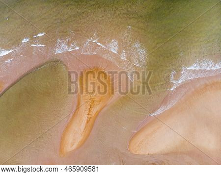 Surf Line On The Sandy Beach Of The Barents Sea. Teriberkamurmansk Oblast, Russia