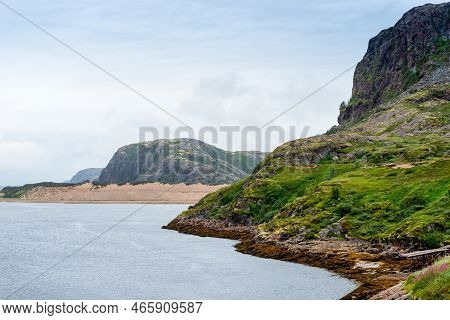 Summer Tundra. Rocky Coastline Of Barents Sea Near Teriberka. Scenery Of Russian North. Kola Peninsu