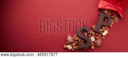 Dutch Holiday Sinterklaas Background With Traditional Sweets And Chocolate Letter.