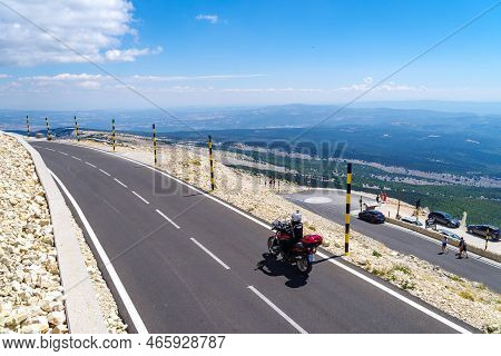 Bedoin, France - August 7, 2022: Motorcyclist On The Top Of Mont Ventoux. At 1,909 m (6,263 ft), It 