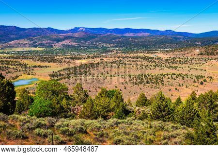 Susanville In California Viewed From U.s. Route 139 With Sierra Nevada Mountains In The Background.