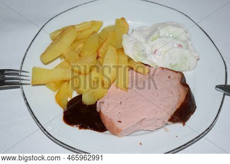 Fries With White Sauce Cucumber And Fleischkäse