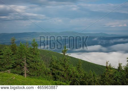 View From  Serak In Jeseniky Mountains On A Summer Foggy Morning And  Sea Of Clouds Around Mountain 