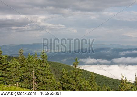 View From  Serak In Jeseniky Mountains On A Summer Foggy Morning And  Sea Of Clouds Around Mountain 