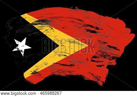 East Timor Flag On Distressed Black Stroke Brush Background