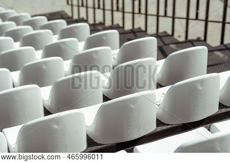 Seats Of Tribune On Sport Stadium. Concept Of Fans, Chairs For Audience, Cultural Environment Concep