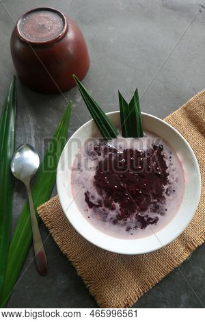 Black Sticky Rice Porridge In A Bowl. Bubur Ketan Hitam