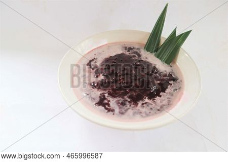 Black Sticky Rice Porridge In A Bowl. Bubur Ketan Hitam