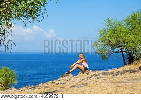 Happy Woman Walking On Summer Sea Beach Holiday. Beautiful Girl Relaxing On High Ocean Cliff. Lookin
