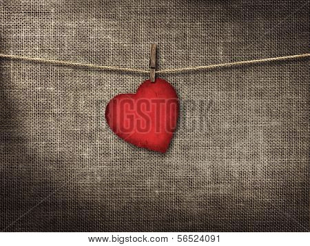 Valentine Card Heart Shaped From Old Red Paperr Hanging On A Clo