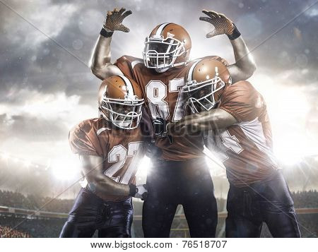 American football players in action on stadium
