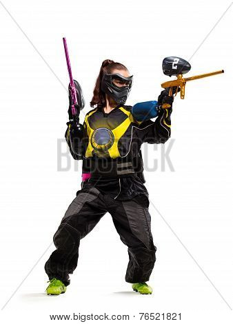 Painball player in action isolated