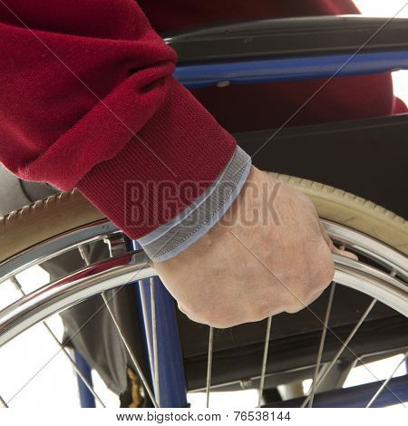 Wheelchair user makes various movements with his wheelchair, exercises for safety handling
