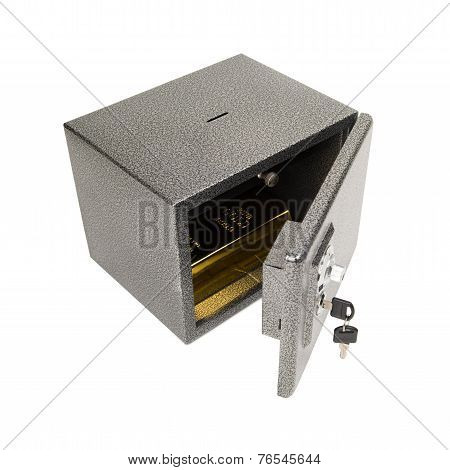 Opened safe with golden piece.