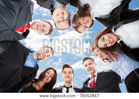 Business People Standing In Circle