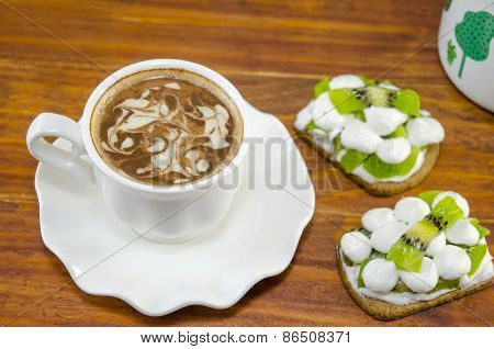 Cup Of Coffee With Decorated Foam
