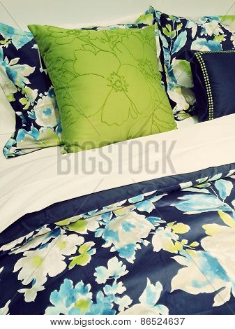 Blue And Green Bed Linen With Floral Design