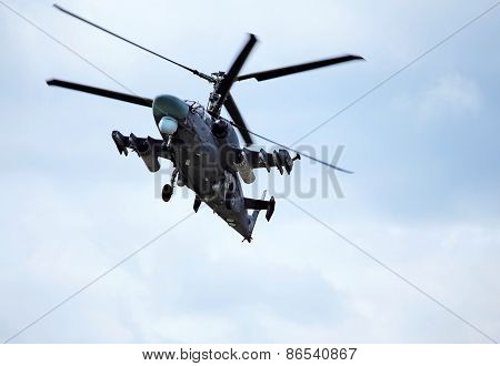 Combat Helicopter In Flight