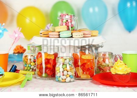 Prepared birthday table with sweets for children party