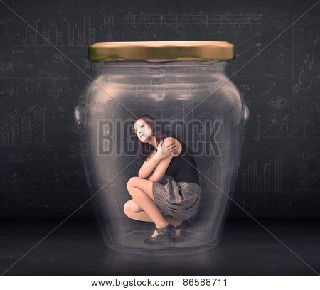 Businesswoman shut inside a glass jar concept concept on background
