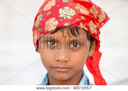 Sikh Boy Visiting The Golden Temple In Amritsar, Punjab, India.