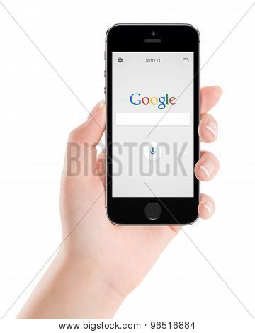 Google Search Application On The Black Apple Iphone 5S Display In Female Hand