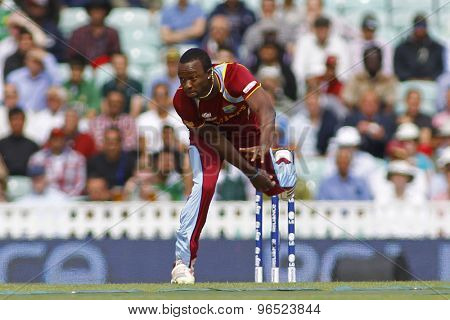 LONDON, ENGLAND - June 07 2013: West Indies Kemar Roach bowling during the ICC Champions Trophy cricket match between Pakistan and The West Indies at The Oval Cricket Ground.