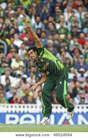 LONDON, ENGLAND - June 07 2013: Pakistan's Mohammad Irfan bowling during the ICC Champions Trophy cricket match between Pakistan and The West Indies at The Oval Cricket Ground.