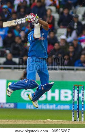 EDGBASTON, ENGLAND - June 23 2013:India's Shikhar Dhawan plays a shot during the ICC Champions Trophy final cricket match between England and India at Edgbaston Cricket Ground